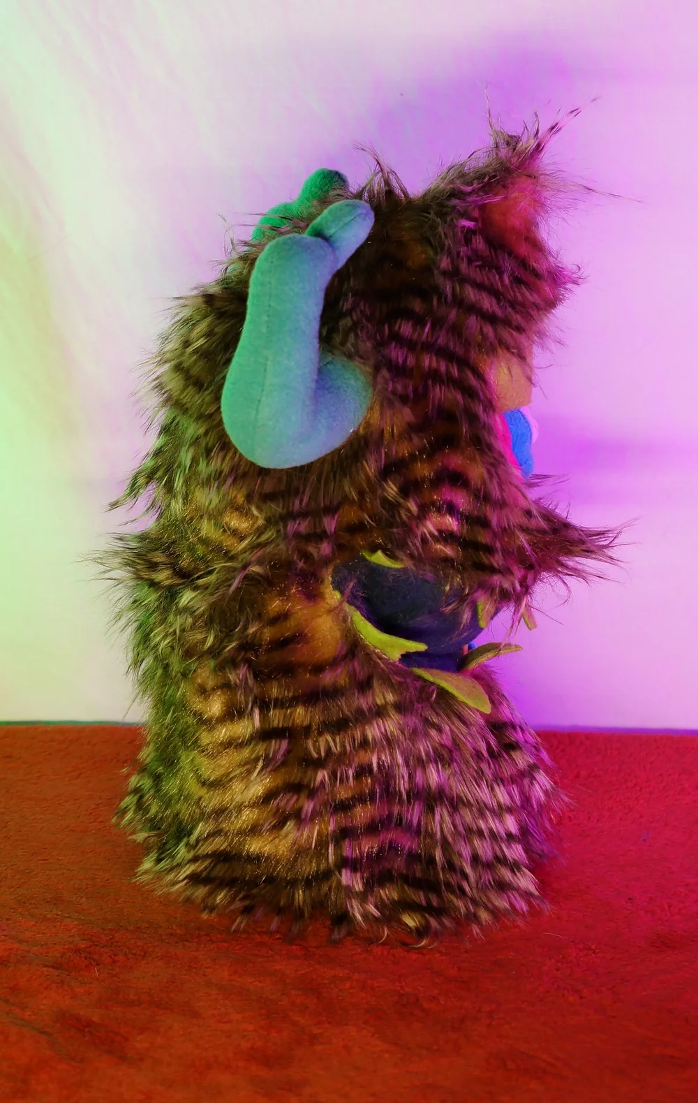 LARGE BROWN STRIPED ONE EYED MONSTER WITH HORNS & POCKET MOUTH